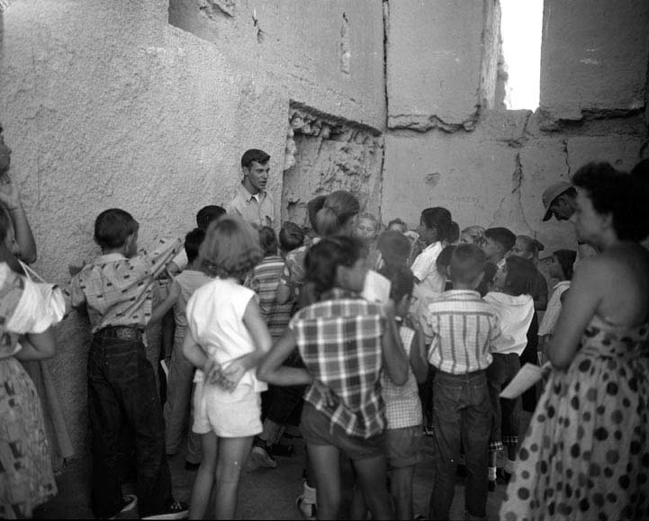 Students on a tour inside Casa Grande in 1956