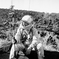 Gene Phillippi resting on the edge of the Bonito Lava Flow